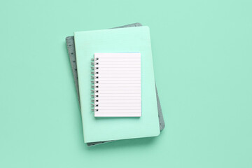 Set of notebooks on color background