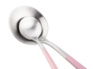 Stainless steel spoons with pink handles on white background