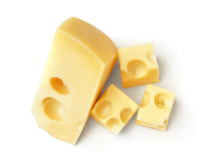 Piece and cubes of Swiss cheese on white background