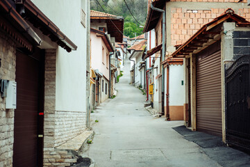 A narrow street of the old European city going up. Sarajevo, the capital of Bosnia and Herzegovina,...