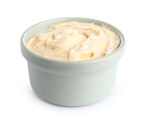 Bowl with tasty cream cheese on white background