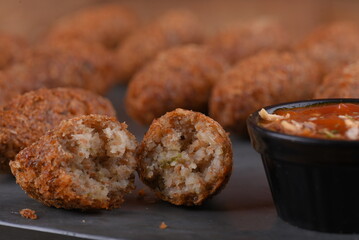 Fried and breaded codfish cake, fish empanadas, codfish cake, Brazilian-style codfish cakes, meat disc