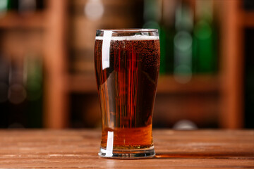 Glass of beer on table in bar. Oktoberfest celebration