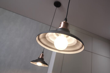 Modern design pendant lamp in the living room. Ceiling lamp