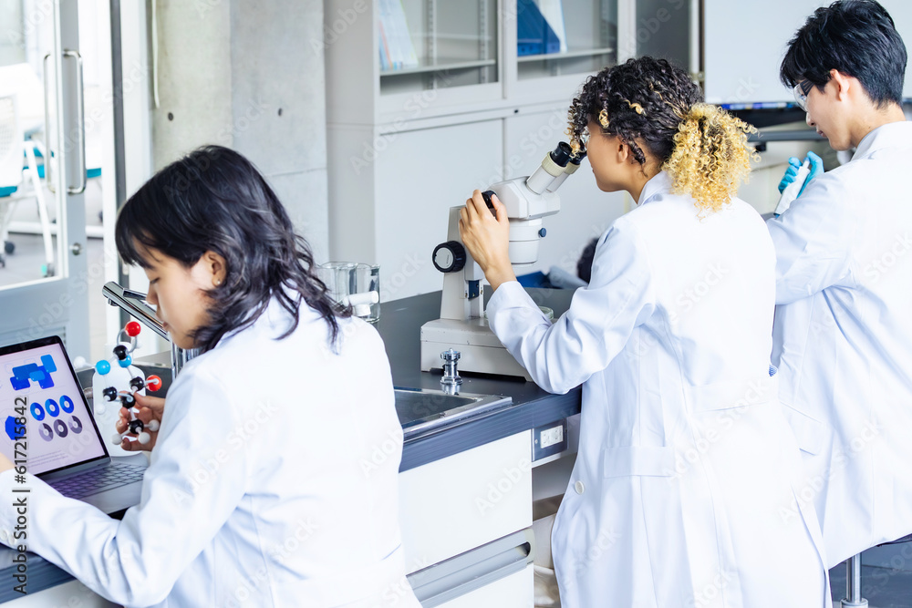 Poster multinational researcher group experimenting in the lab. research and development.