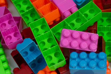 Plastic toy blocks, various colors, various sizes, full background