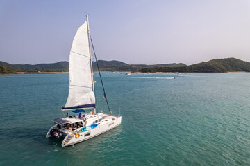 Aerial view of luxury private motor yacht on the ocean during summer. 