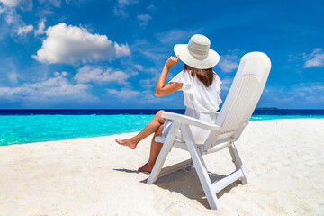 Woman lying in sunbed