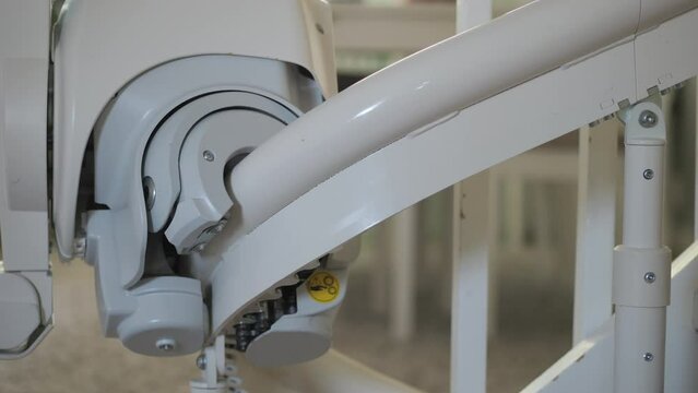 A Child with a disability going up a stairway  on a stairlift