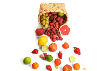 Wicker basket with different fresh fruits on white background