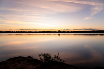 Natural landscape of a lake at sunset.