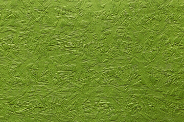 Green color eco recycled kraft paper sheet texture cardboard background.