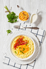 Cheddar Cheese Grits Casserole with bacon slices