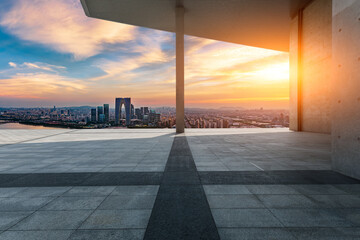 walkway and city skyline with modern building at sunset in Suzhou, China. high angle view.
