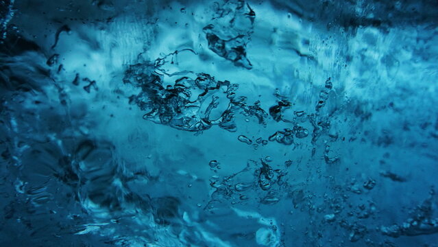 blue background, water in ice