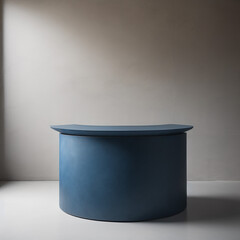 Blank midnight blue concrete curve counter podium with a textured surface, bathed in soft and beautiful dappled sunlight, against a pristine white wall