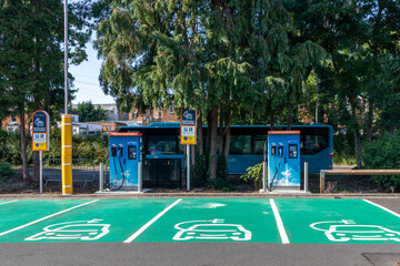 Rapid electric charging stations and bays