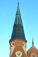 A view of the spire on a church in the city