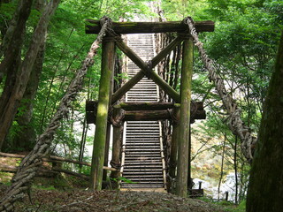 Tokushima, Japan - June 25, 2023: Oku-Iya double vine bridge or Oku-Iya Nijuu Kazura bridge. A suspension bridge made of the plant called Shirakuchikazura.
