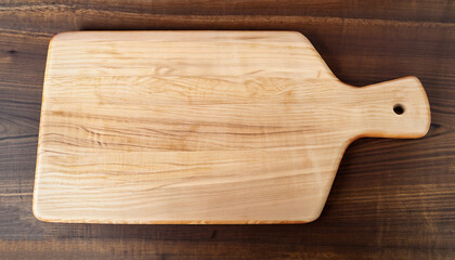 Top view of wooden tray on wooden table background.