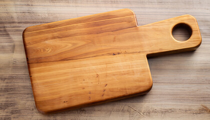 Top view of wooden tray on wooden table background.
