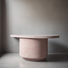 Vacant blush pink concrete counter podium with a smooth curve and intricate texture, adorned with soft and captivating dappled sunlight against a dove gray wall