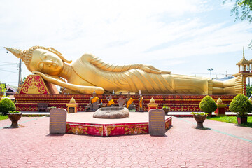 reclined buddha statue at wat that luang, vientiane