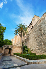 Naklejka premium Royal Palace of La Almudaina next to cathedral La Seu. One of the official residences of the Spanish royal family. City Palma de Mallorca. Balearic Islands Spain. Travel agency vacation concept.