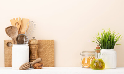 Kitchen utensils on wooden table