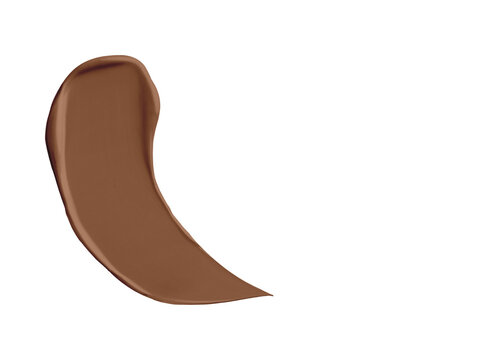Cinnamon Brown BB Cream cosmetic swipe smear smudge isolated on white background. cinnamon brown color brush stroke close up. Makeup cream texture background