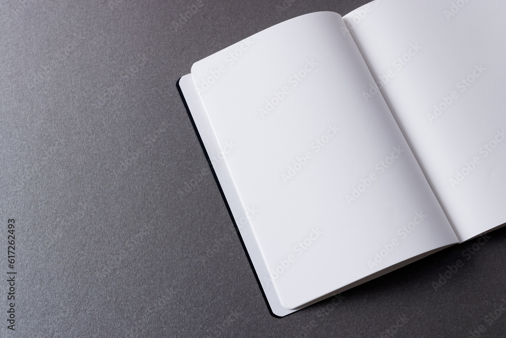 Aufkleber close up of open book with copy space on grey background