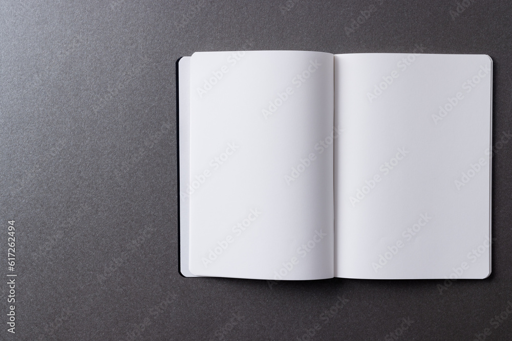 Aufkleber close up of open book with copy space on grey background