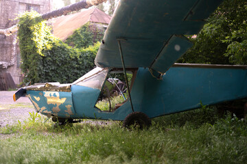 old abandoned small plane left in the forest