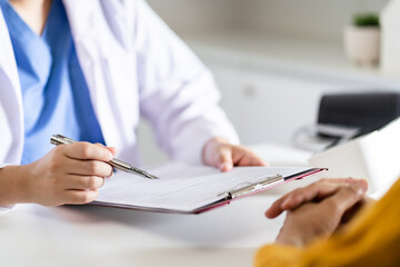 Healthcare. Doctor and patient are discussing interview consulting patient. Professional medical...