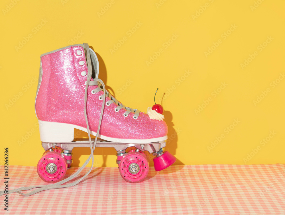 Wall mural summer creative layout with pink roller skate with whipped cream and bright red cherry on pastel pin