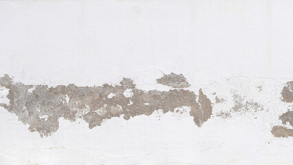 Old white wall with peeling plaster, grunge background