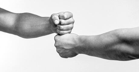 Friendly handshake, friends greeting. Hands of man people fist bump team teamwork, success. Man...