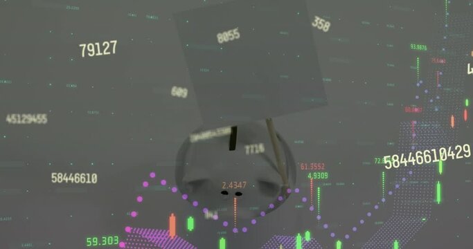 Animation of changing numbers and financial data processingagainst piggy pank and blank placard