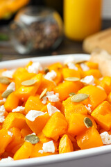 Concept of tasty homemade dish - baked pumpkin