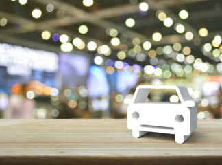 Car 3d icon on wooden table over blur light and shadow of shopping mall, Business transportation service concept