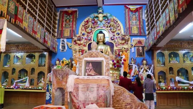 buddha statue at buddhist monastery inside view at morning from different angle