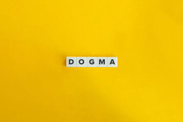 Dogma Word on Block Letter Tiles on Yellow Background. Minimal Aesthetic.