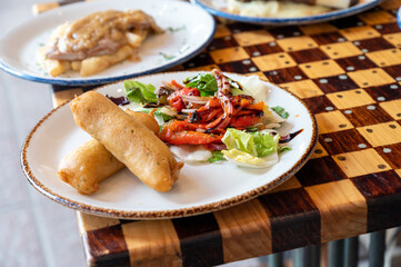 Wholesome, colorful plate of fresh fruits and vegetables - a scrumptious healthy meal.