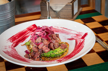 Wholesome, colorful plate of fresh fruits and vegetables - a scrumptious healthy meal.