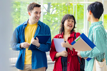 Multinational group smiling inside the building. International students.
