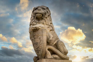 Guarding lion scrupture at the Royal castle in Lublin, Poland - obrazy, fototapety, plakaty