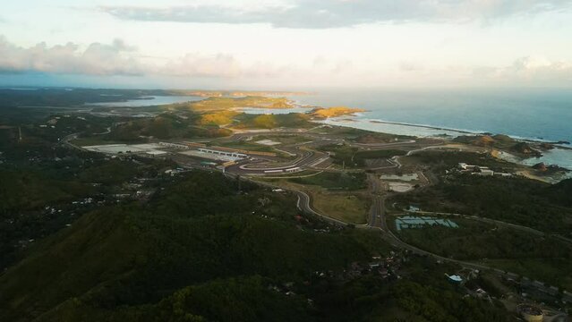 Aerial of the Pertamina Mandalika International Street Circuit track , Kuta, Lombok Island, Indonesia. Drone slow orbit