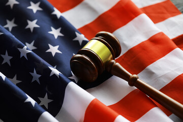 Judge's gavel on the table in focus. Cropped view of Judge's hammer for attention and verdict,...
