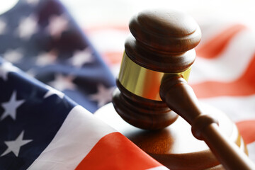 Judge's gavel on the table in focus. Cropped view of Judge's hammer for attention and verdict,...