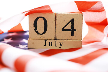 July 4th wooden Stars and Stripes flag on background with flag of the USA. Summer day. Independence...